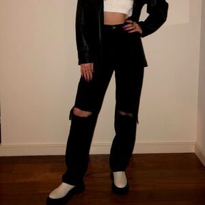 High rise black jeans knee rips. Extra long lega